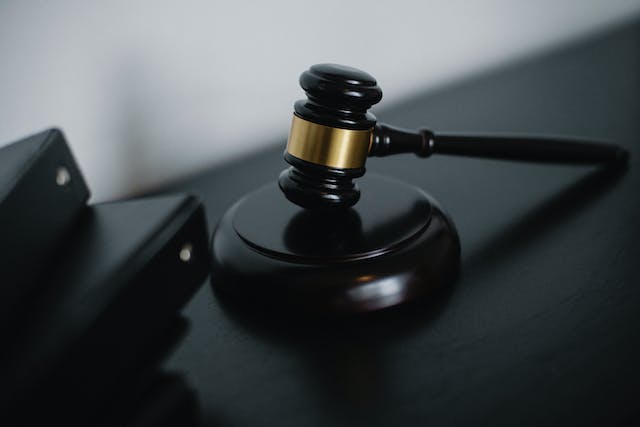 black and gold judges gavel during a housing discrimination case